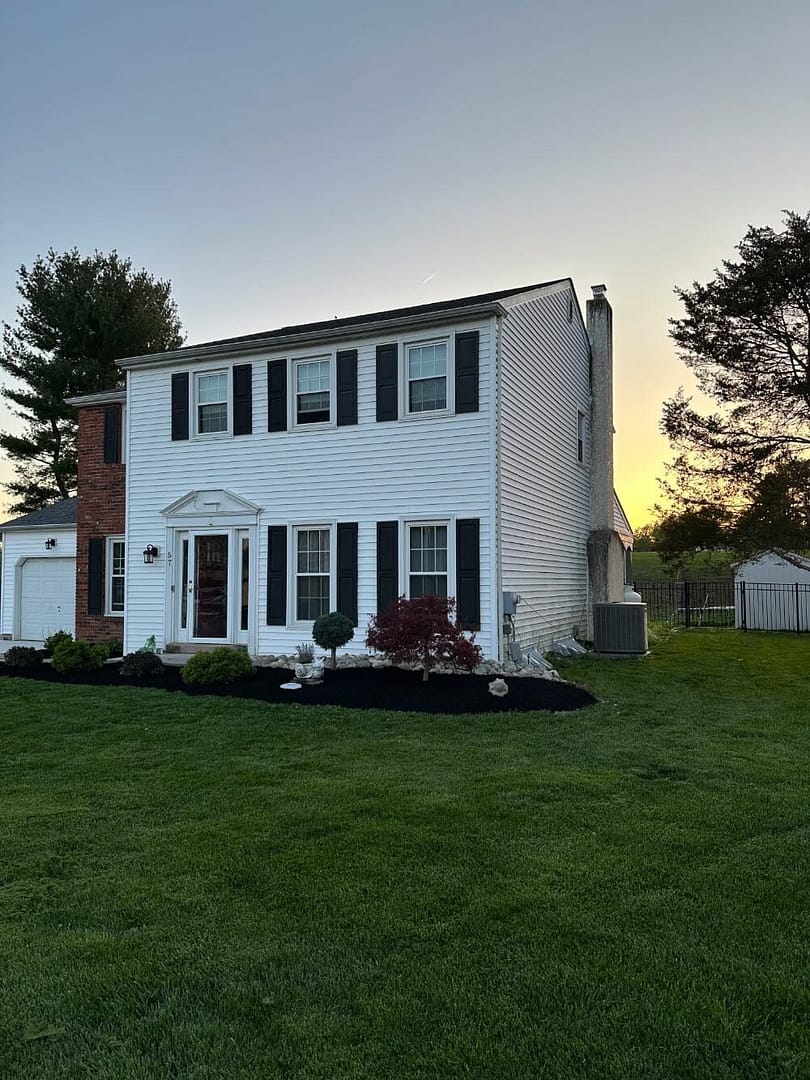 house after new mulch and landscaping project