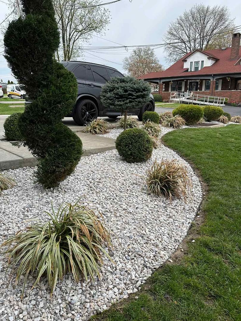 landscaping project with rock layer complete