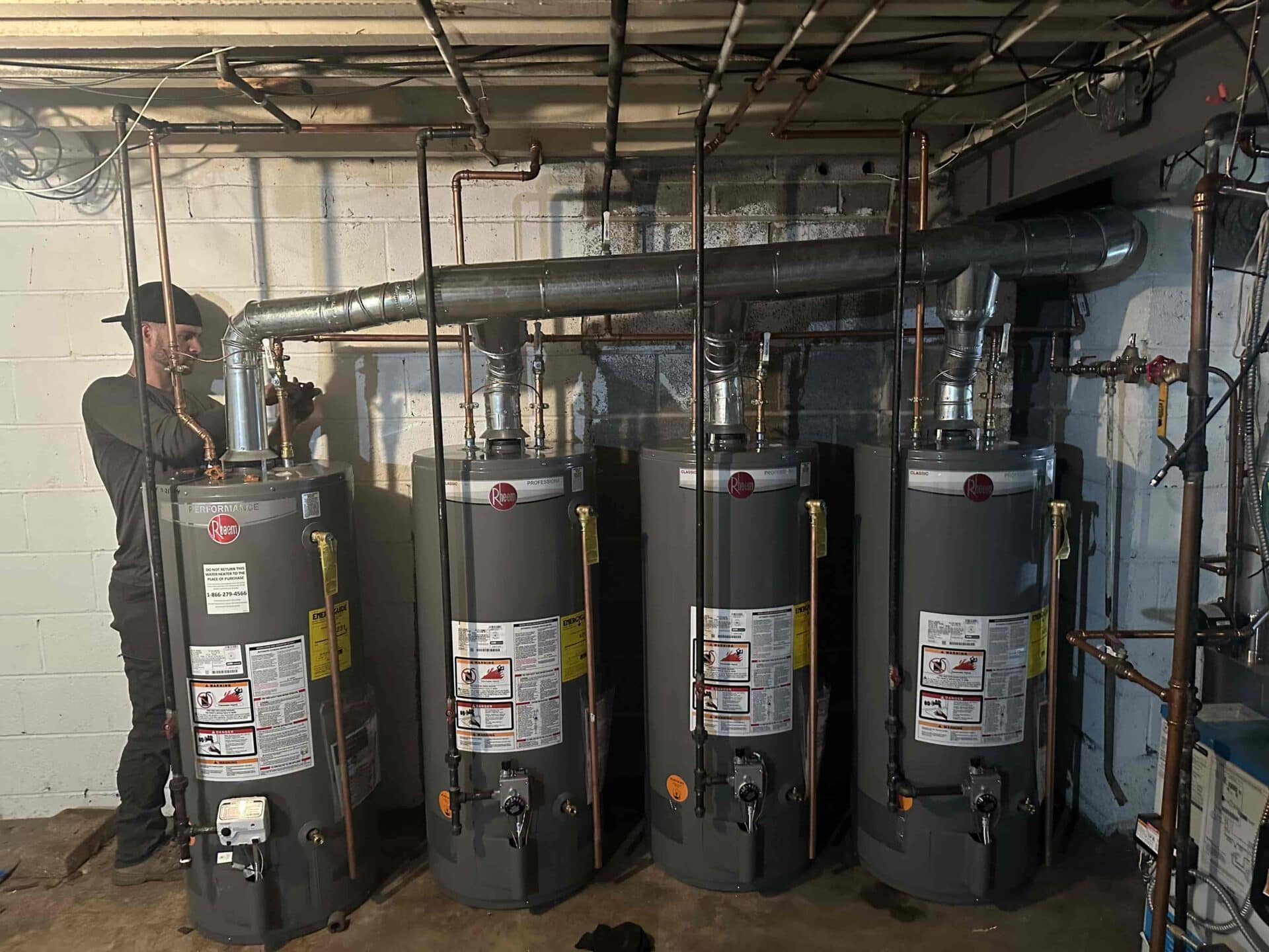 a group of water heaters in a basement after replacement a group of water heaters in a basement after replacement